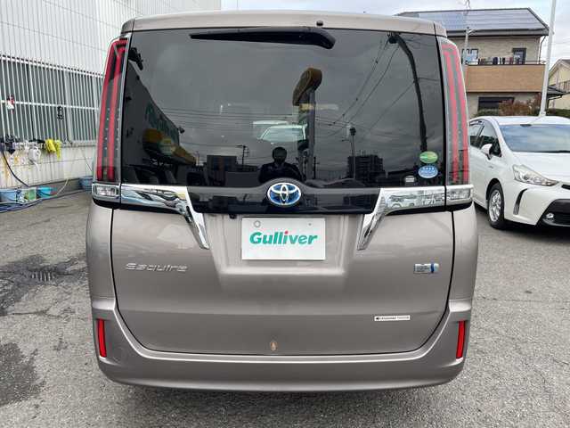 トヨタ エスクァイア ハイブリッド Gi プレミアムパッケージ 神奈川県 2018(平30)年 6.8万km アバンギャルドブロンズメタリック 純正ナビ/AM/FM/DVD/CD/Bluetooth接続/HDMI接続/USB接続/フルセグTV/純正フリップダウンモニター/クルーズコントロール/両側パワースライドドア/前席シートヒーター/ビルトインETC/前方ドライブレコーダー/フロント＋バックカメラ/トヨタセーフティーセンス/LEDライト/オートライト