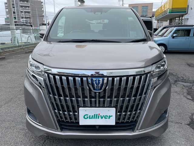 トヨタ エスクァイア ハイブリッド Gi プレミアムパッケージ 神奈川県 2018(平30)年 6.8万km アバンギャルドブロンズメタリック 純正ナビ/AM/FM/DVD/CD/Bluetooth接続/HDMI接続/USB接続/フルセグTV/純正フリップダウンモニター/クルーズコントロール/両側パワースライドドア/前席シートヒーター/ビルトインETC/前方ドライブレコーダー/フロント＋バックカメラ/トヨタセーフティーセンス/LEDライト/オートライト