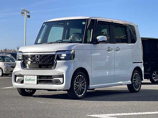 ホンダ Ｎ ＢＯＸ カスタム ターボ 鹿児島県 2024(令6)年 0.4万km プラチナホワイトパール ワンオーナー/純正7インチナビ/フルセグテレビ/BT/USB/FM.AM/両側パワースライドドア/衝突軽減ブレーキ/車線逸脱防止機能/オートハイビーム/レーダークルーズコントロール/踏み間違い衝突軽減システム/パーキングセンサー警報/ステアリングスイッチ/電動ミラー/フロアマット/ドアバイザー/純正15インチアルミホイール/スマートキー×2/保証書/取扱説明書