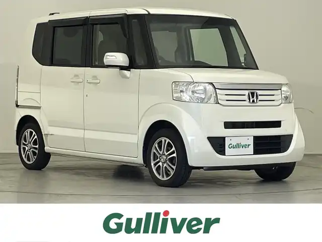 ホンダ Ｎ ＢＯＸ G Lパッケージ 滋賀県 2013(平25)年 6.6万km プレミアムホワイトパール 禁煙車/純正ナビ/（CD/DVD/ワンセグTV）/バックカメラ/片側パワースライドドア/アイドリングストップ/ナビ連動ステアリングリモコン/オートエアコン/プッシュスタート/スマートキー/スペアキー/純正14インチAW/ウインカー付電動格納ミラー