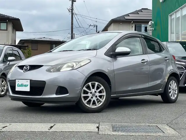 マツダ デミオ 13C－V 静岡県 2009(平21)年 9.6万km アルミニウムメタリック パワーステアリング/パワーウィンドウ/リモコンキー/オートエアコン/ETC/7インチメモリナビ（CD.DVD.BT.ワンセグ）/ドライブレコーダー/純正フロアマット/ABS/オートライト/Wエアバック