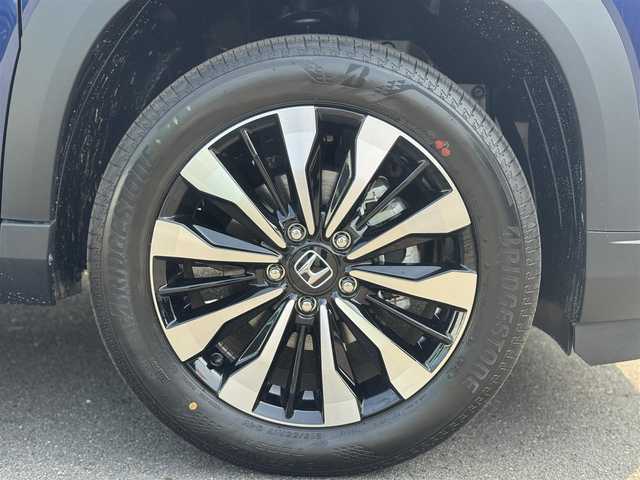 ホンダ ＷＲ－Ｖ Z 三重県 2025(令7)年 0.1万km未満 オブシダンブルーパール 登録未使用車/ホンダセンシング /・衝突軽減ブレーキ/・誤発進抑制機能/・後方誤発進抑制機能/・近距離衝突軽減ブレーキ/・歩行者事故低減ステアリング/・路外逸脱抑制機能/・アダプティブクルーズコントロール/・車線維持支援システム/・先行車発進お知らせ機能/・標識認識機能/・オートハイビーム/・パーキングセンサーシステム/ナビ装着用スペシャルパッケージ/・ステアリングスイッチ/　(オーディオ/ナビ/ハンズフリー/音声認識)/・リアワイドカメラ/・車載通信機/・Bluetoothユニット/パドルシフト/USBジャック(運転席)/充電用USBジャック(助手席)/純正17インチ5本マルチスポークアルミホイール/フルLEDヘッドランプ/・オートライト/LEDフロントフォグランプ/プッシュエンジンスタート/スマートキー×2