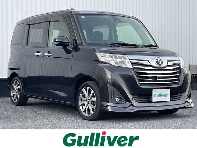 トヨタ ルーミー カスタムG－T 千葉県 2018(平30)年 4万km ブラックマイカメタリック 純正9インチナビ/(フルセグTV/BT/CD/DVD/FM/AM)/バックカメラ/衝突被害軽減システム/車線逸脱警報/クルーズコントロール/両側パワースライドドア/横滑り防止装置/ETC/アイドリングストップ/LEDヘッドライト/フォグランプ/オートライト/ウィンカーミラー/電動格納ミラー/純正15インチAW/前席シートヒーター/シートリフター/プッシュスタート/スマートキー/フロアマット/スペアキー/取扱説明書/保証書