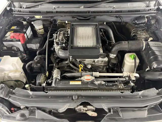 スズキ ジムニー クロスアドベンチャー 佐賀県 2012(平24)年 8.1万km クエーサーグレーメタリック タイヤサイズ195R16C 104/102Q 6PR /２インチリフトUP/社外サスペンション＆ショックアブソーバー/調整式ラテラルロッド/社外7インチメモリーナビ【CN-E202Z】/ワンセグTV/CD/純正１６インチアルミホイール/運転席シートヒーター/合皮シート/フォグライト/キーレス/スペアキー×１/電動格納ミラー/フロアマット/HITACHI製タービン/サイドアンダーミラー/ドアバイザー