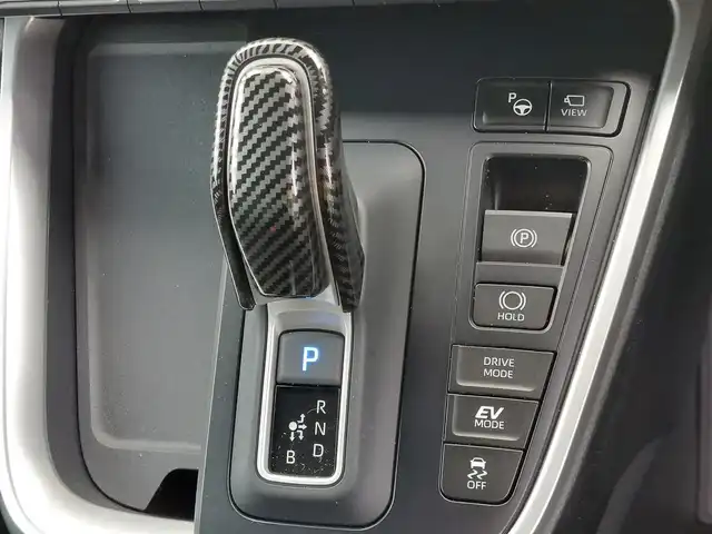 トヨタ ヴォクシー ハイブリッド S－Z 東京都 2025(令7)年 0.2万km マッシブグレー ワンオーナー/快適利便パッケージ（High）/・ハンズフリーデュアルパワースライドドア/・パワーバックドア/・「ナノイーX」/・ステアリングヒーター/・2列目キャプテンシート・シートヒーター・オットマン/Toyota Safety Sense/・プリクラッシュセーフティ/・レーントレーシングアシスト/・先行車発進告知機能/・オートマチックハイビーム/・レーダークルーズコントロール/・クリアランスソナー/・ロードサインアシスト/・ブラインドスポットモニター/・パノラミックビューモニター/トヨタチームメイト/・アドバンスドパーク（駐車支援）/・ドライバー異常時対応システム/純正10型メーカーナビ/フルセグTV/フリップダウンモニター/ETC2.0/デジタルインナーミラー型ドライブレコーダー/100V電源/ハーフレザーシート/ステアリングヒーター/後席ロールサンシェード/３眼LEDヘッドライト/ドアバイザー/17インチ純正アルミホイール/スマートキー