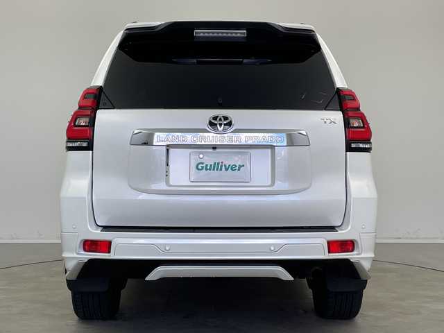 トヨタ ランドクルーザー プラド TX Lパッケージ 新潟県 2022(令4)年 3.2万km ホワイトパールクリスタルシャイン 7人乗り/サンルーフ/モデリスタエアロ/ベージュ革シート/純正メーカーOPナビ/パノラミックビューモニター/プリクラッシュセーフティ/レーダークルーズコントロール/レーンキープアシスト/ブラインドスポットモニター/エアシート/ビルトインETC/ドライブレコーダー/前席パワーシート/オートライト/オートハイビーム/LEDヘッドライト/前後コーナーセンサー/プッシュスタート