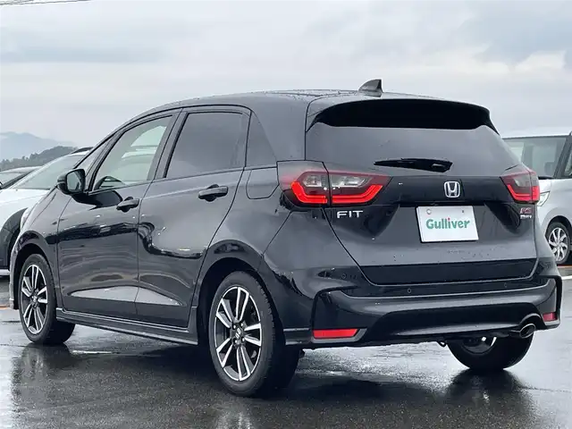 ホンダ フィット e:HEV RS 佐賀県 2023(令5)年 7.3万km クリスタルブラックパール ワンオーナー/純正9インチHondaCONNECTディスプレー/バックカメラ/前後ドライブレコーダー/ビルトインETC2.0/電子パーキングブレーキ/・BRAKE HOLD機能/ハーフレザーシート/ISOFIX対応/パドルシフト/革巻きステアリング/ステアリングリモコン/純正16インチアルミホイール/純正LEDヘッドライト/・オートマチックハイビーム/純正フロアマット/純正ドアバイザ―/新車保証書/取扱説明書/スペアキー１本/ホンダセンシング/・アダプティブクルーズコントロール/・衝突被害軽減ブレーキ/・先行車発進お知らせ機能/・路外逸脱抑制機能/・レーンキープアシストシステム/・標識認識機能/・パーキングセンサーシステム