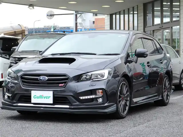 スバル レヴォーグ 1．6STIスポーツアイサイト 神奈川県 2016(平28)年 2.9万km ダークグレーメタリック ブラインドスポットモニター/STIエアロ/STI純正18インチモニター/STIマフラー/シートヒーター/メモリナビ(CN-LR720D)/Biuetoothオーディオ/フルセグテレビ/バックカメラ/アイドリングストップ/ウィンカーミラー/アクティブクルーズコントロール/ドアバイザー/プッシュスタート/ETC/保証書/取説/記録簿(H29/30/R2/5)/スペアキー