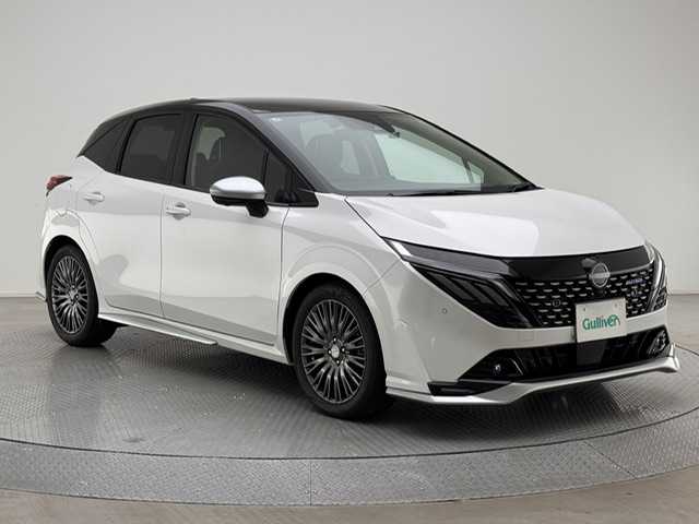 日産 オーラ オーテック 兵庫県 2025(令7)年 0.2万km ピュアホワイトパール / スーパーブラック 2トーン ワンオーナー/純正コネクトナビ/フルセグ BT USB HDMI/BOSEプレミアムサウンド/プロパイロット/レーダークルーズコントロール/エマージェンシーブレーキ/LKA/BSM/コーナーセンサー/純正ドライブレコーダー/純正ビルトインETC2.0/インテリジェントルームミラー/アラウンドビューモニター/レザーシート/パワーシート/シートヒーター/スマートキー