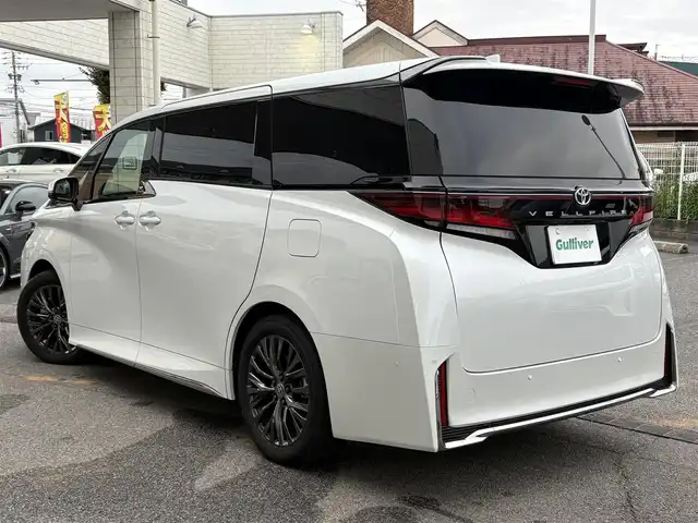 トヨタ ヴェルファイア Z プレミア 愛知県 2024(令6)年 0.7万km プラチナホワイトパールマイカ ワンオーナー/全方位カメラ/オットマン/両側パワースライドドア/独立ガラスルーフ/3列シート/後席モニター/追従クルーズコントロール/プリクラッシュ/コーナーセンサー前後/純正14インチナビ/Bluetooth/USB/フルセグTV/ビルトインETC/パドルシフト/パワーシート/レザーシート/エアシート/シートヒーター/ステアリングヒーター/オートマチックハイビーム/純正アルミホイール/ABS/BSM/レーンキープアシスト/横滑り防止装置/盗難防止装置/スペアキー