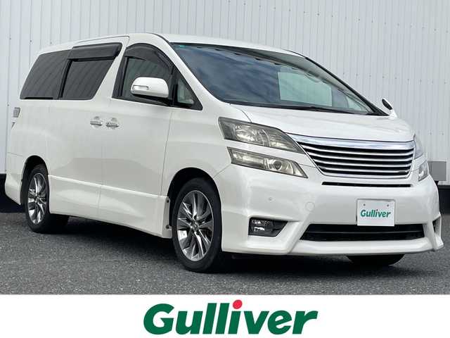 トヨタ ヴェルファイア 2．4Z プラチナセレクションⅡ 千葉県 2010(平22)年 5万km ホワイトパールクリスタルシャイン アルパイン8インチナビ/(フルセグTV/BT/CD/DVD/FM/AM)/バックカメラ/アルパインフリップダウンモニター/両側パワースライドドア/電動リアゲート/横滑り防止装置/ビルトインETC/フォグランプ/ウィンカーミラー/電動格納ミラー/純正18インチAW/シートリフター/プッシュスタート/スマートキー/フロアマット/ドアバイザー/スペアキー/取扱説明書/保証書