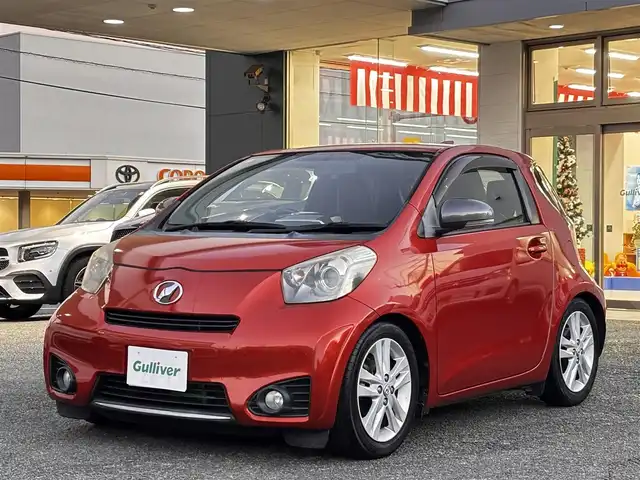 トヨタ ｉＱ 130G レザーパッケージ 熊本県 2012(平24)年 4.7万km オレンジM 純正メモリナビ（NSLN-W62）/【フルセグTV/Bluetooth/HDMI/USB】/ハーフレザーシート/純正16インチアルミホイール/社外車高調/ETC/ステアリングスイッチ/革巻きステアリング/M/Tモード/横滑り防止/プッシュスタート/スマートキー/ウインカーミラー/オートライト/オートエアコン/純正フロアマット