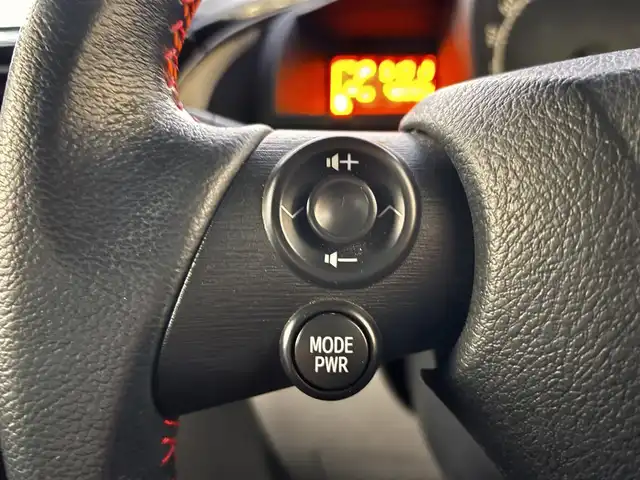 トヨタ ｉＱ 130G レザーパッケージ 熊本県 2012(平24)年 4.7万km オレンジM 純正メモリナビ（NSLN-W62）/【フルセグTV/Bluetooth/HDMI/USB】/ハーフレザーシート/純正16インチアルミホイール/社外車高調/ETC/ステアリングスイッチ/革巻きステアリング/M/Tモード/横滑り防止/プッシュスタート/スマートキー/ウインカーミラー/オートライト/オートエアコン/純正フロアマット