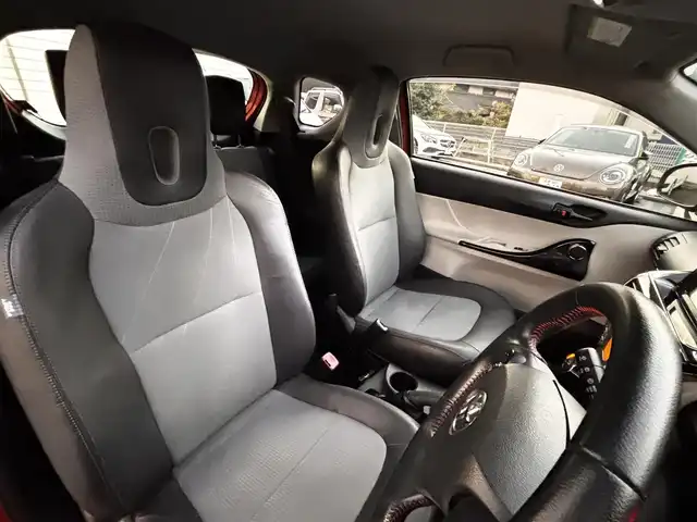 トヨタ ｉＱ 130G レザーパッケージ 熊本県 2012(平24)年 4.7万km オレンジM 純正メモリナビ（NSLN-W62）/【フルセグTV/Bluetooth/HDMI/USB】/ハーフレザーシート/純正16インチアルミホイール/社外車高調/ETC/ステアリングスイッチ/革巻きステアリング/M/Tモード/横滑り防止/プッシュスタート/スマートキー/ウインカーミラー/オートライト/オートエアコン/純正フロアマット