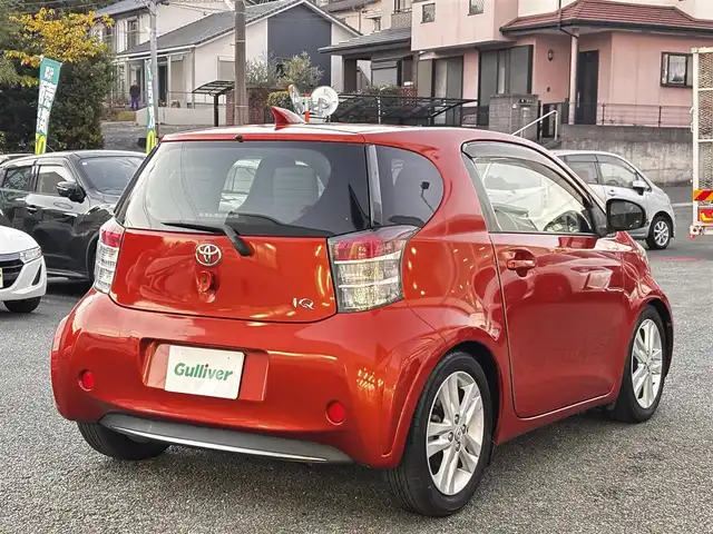 トヨタ ｉＱ 130G レザーパッケージ 熊本県 2012(平24)年 4.7万km オレンジM 純正メモリナビ（NSLN-W62）/【フルセグTV/Bluetooth/HDMI/USB】/ハーフレザーシート/純正16インチアルミホイール/社外車高調/ETC/ステアリングスイッチ/革巻きステアリング/M/Tモード/横滑り防止/プッシュスタート/スマートキー/ウインカーミラー/オートライト/オートエアコン/純正フロアマット