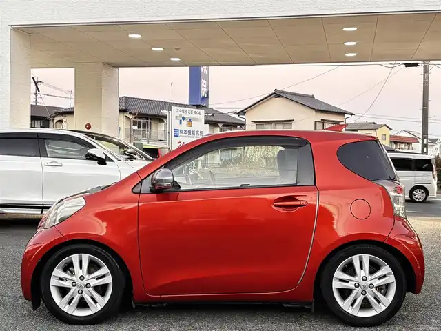 トヨタ ｉＱ 130G レザーパッケージ 熊本県 2012(平24)年 4.7万km オレンジM 純正メモリナビ（NSLN-W62）/【フルセグTV/Bluetooth/HDMI/USB】/ハーフレザーシート/純正16インチアルミホイール/社外車高調/ETC/ステアリングスイッチ/革巻きステアリング/M/Tモード/横滑り防止/プッシュスタート/スマートキー/ウインカーミラー/オートライト/オートエアコン/純正フロアマット