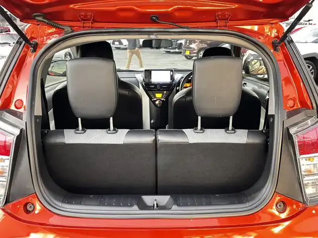 トヨタ ｉＱ 130G レザーパッケージ 熊本県 2012(平24)年 4.7万km オレンジM 純正メモリナビ（NSLN-W62）/【フルセグTV/Bluetooth/HDMI/USB】/ハーフレザーシート/純正16インチアルミホイール/社外車高調/ETC/ステアリングスイッチ/革巻きステアリング/M/Tモード/横滑り防止/プッシュスタート/スマートキー/ウインカーミラー/オートライト/オートエアコン/純正フロアマット