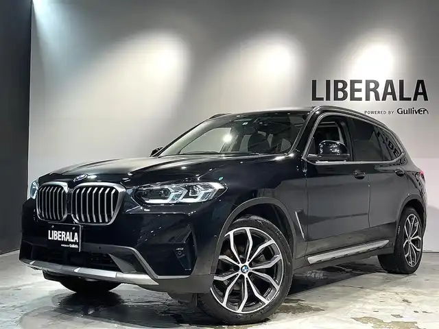 ＢＭＷ Ｘ３ xDrive20d 道央・札幌 2022(令4)年 3.9万km サファイアブラックP セレクトpkg/　・ステアリング・ホイール・ヒーティング/　・アコースティック・ガラス/　・電動パノラマ・ガラス・サンルーフ/　・リヤ・サイド・ウィンドー・ローラー・ブラインド（手動）/　・サンプロテクション・ガラス/　・リヤ・シート・バックレスト・アジャストメント/　・リヤ・シート・ヒーティング/レザーpkg/　・ヴァーネスカ・レザー・シート/　・アクティブ・ベンチレーション・シート/　・フロント・ランバー・サポート（電動調節式）/　・インテリア・トリム（ダーク・オーク・ファイン・ウッド・トリム）/ドライビング・アシスト・プロフェッショナル/　・ACC/　・レーン・ディパーチャー・ウォーニング/　・レーン・チェンジ・ウォーニング/　・レーン・チェンジ・アシスト/　・レーン・キーピング・アシスト/パーキングアシスト+/　・PDC/　・パーキングアシスト/BMWヘッドアップディスプレイ/電動シート（D/N）/シートヒーター（ALL）/ワイヤレスチャージング/アンビエントライト/オートライト/レインセンサー/パワーバックドア/ETC/保証書、取扱説明書、スペアキー1本有