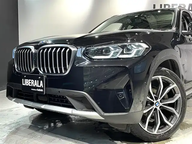 ＢＭＷ Ｘ３ xDrive20d 道央・札幌 2022(令4)年 3.9万km サファイアブラックP セレクトpkg/　・ステアリング・ホイール・ヒーティング/　・アコースティック・ガラス/　・電動パノラマ・ガラス・サンルーフ/　・リヤ・サイド・ウィンドー・ローラー・ブラインド（手動）/　・サンプロテクション・ガラス/　・リヤ・シート・バックレスト・アジャストメント/　・リヤ・シート・ヒーティング/レザーpkg/　・ヴァーネスカ・レザー・シート/　・アクティブ・ベンチレーション・シート/　・フロント・ランバー・サポート（電動調節式）/　・インテリア・トリム（ダーク・オーク・ファイン・ウッド・トリム）/ドライビング・アシスト・プロフェッショナル/　・ACC/　・レーン・ディパーチャー・ウォーニング/　・レーン・チェンジ・ウォーニング/　・レーン・チェンジ・アシスト/　・レーン・キーピング・アシスト/パーキングアシスト+/　・PDC/　・パーキングアシスト/BMWヘッドアップディスプレイ/電動シート（D/N）/シートヒーター（ALL）/ワイヤレスチャージング/アンビエントライト/オートライト/レインセンサー/パワーバックドア/ETC/保証書、取扱説明書、スペアキー1本有