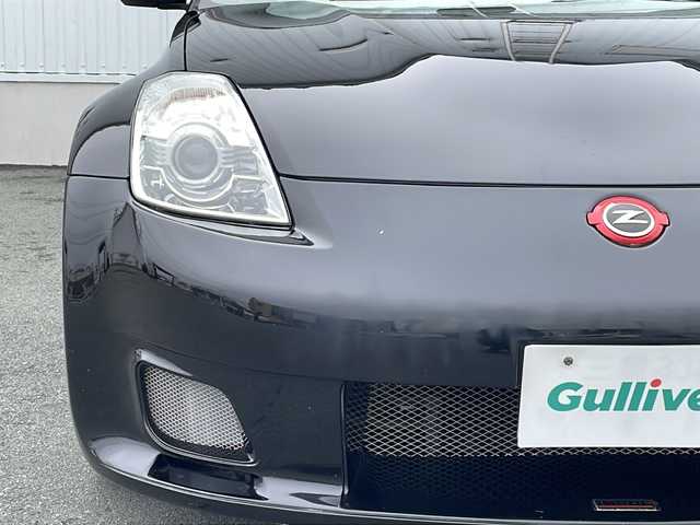 日産 フェアレディ Ｚ ロードスター バージョンST 三重県 2007(平19)年 3.7万km ダイヤモンドブラック IMPULマフラー/IMPULエアロ/スペアキー/電動格納ミラー/ビルトインETC/オートエアコン/バックカメラ/純正DVDナビ/BOSEプレミアムサウンド/純正フロアマット/パワーシート(D＋N席)/シートヒーター(D＋N席)/革巻きステアリング/電動オープン/横滑り防止/取扱説明書/保証書/momoステアリング
