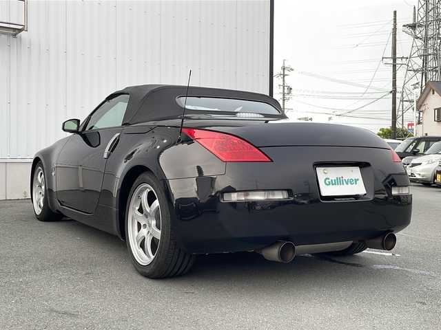 日産 フェアレディ Ｚ ロードスター バージョンST 三重県 2007(平19)年 3.7万km ダイヤモンドブラック IMPULマフラー/IMPULエアロ/スペアキー/電動格納ミラー/ビルトインETC/オートエアコン/バックカメラ/純正DVDナビ/BOSEプレミアムサウンド/純正フロアマット/パワーシート(D＋N席)/シートヒーター(D＋N席)/革巻きステアリング/電動オープン/横滑り防止/取扱説明書/保証書/momoステアリング