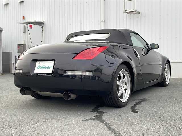 日産 フェアレディ Ｚ ロードスター バージョンST 三重県 2007(平19)年 3.7万km ダイヤモンドブラック IMPULマフラー/IMPULエアロ/スペアキー/電動格納ミラー/ビルトインETC/オートエアコン/バックカメラ/純正DVDナビ/BOSEプレミアムサウンド/純正フロアマット/パワーシート(D＋N席)/シートヒーター(D＋N席)/革巻きステアリング/電動オープン/横滑り防止/取扱説明書/保証書/momoステアリング
