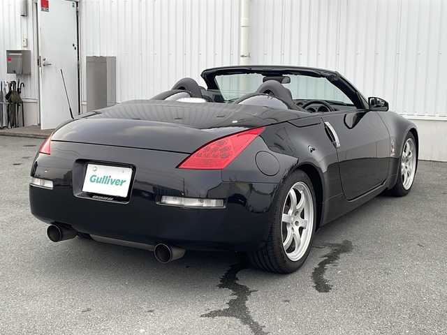 日産 フェアレディ Ｚ ロードスター バージョンST 三重県 2007(平19)年 3.7万km ダイヤモンドブラック IMPULマフラー/IMPULエアロ/スペアキー/電動格納ミラー/ビルトインETC/オートエアコン/バックカメラ/純正DVDナビ/BOSEプレミアムサウンド/純正フロアマット/パワーシート(D＋N席)/シートヒーター(D＋N席)/革巻きステアリング/電動オープン/横滑り防止/取扱説明書/保証書/momoステアリング