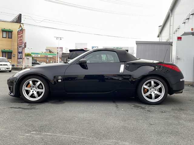 日産 フェアレディ Ｚ ロードスター バージョンST 三重県 2007(平19)年 3.7万km ダイヤモンドブラック IMPULマフラー/IMPULエアロ/スペアキー/電動格納ミラー/ビルトインETC/オートエアコン/バックカメラ/純正DVDナビ/BOSEプレミアムサウンド/純正フロアマット/パワーシート(D＋N席)/シートヒーター(D＋N席)/革巻きステアリング/電動オープン/横滑り防止/取扱説明書/保証書/momoステアリング
