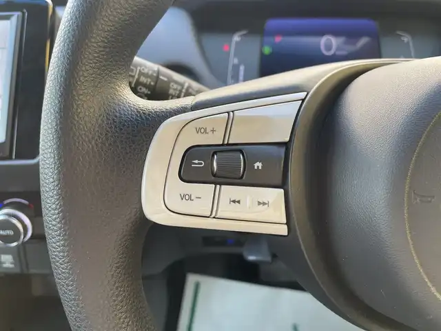 ホンダ フィット ホーム 和歌山県 2020(令2)年 1.9万km ルナシルバーM 純正ナビ（AM/FM/CD/DVD/フルセグTV/USB/Bluetooth）/ワンオーナー/踏み間違い衝突軽減システム/路外逸脱抑制機能/レーンキープアシストシステム/標識認識機能（速度超過お知らせ付）/CMBS警報/ACC先行車検知/先行車発進お知らせ/クルーズコントロール（追従有）/横滑り防止装置/前後ドライブレコーダー/オートライト/オートハイビーム/電子パーキング/前席純正ゴムマット/保証書/取扱説明書