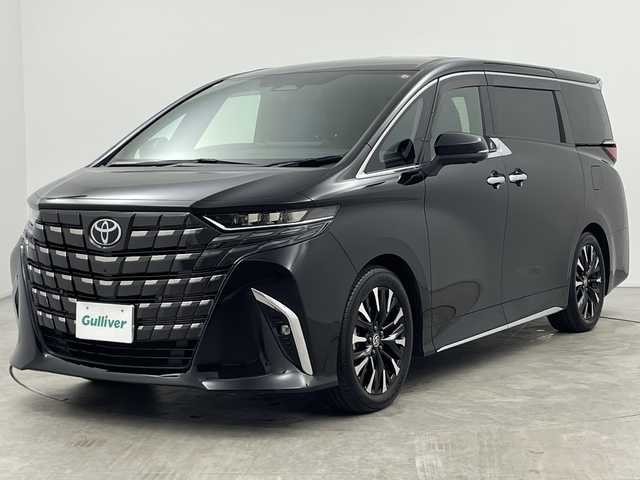 トヨタ アルファードハイブリット エグゼクティブ ラウンジ 三重県 2023(令5)年 2.6万km ブラック 禁煙車/ワンオーナー/純正ナビ/（CD/DVD/BT/AppleCarPlay/AndroidAuto）/フルセグTV/左右独立ムーンルーフ/14インチフリップダウンモニター/JBLスピーカー/デジタルインナーミラー/シートヒーター/ベンチレーション/パノラミックビューモニター/ブラインドスポットモニター/カラーヘッドアップディスプレイ/ステアリングヒーター/後席用パワーサイドサンシェード/純正19インチアルミホイール