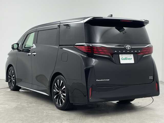 トヨタ アルファードハイブリット エグゼクティブ ラウンジ 三重県 2023(令5)年 2.6万km ブラック 禁煙車/ワンオーナー/純正ナビ/（CD/DVD/BT/AppleCarPlay/AndroidAuto）/フルセグTV/左右独立ムーンルーフ/14インチフリップダウンモニター/JBLスピーカー/デジタルインナーミラー/シートヒーター/ベンチレーション/パノラミックビューモニター/ブラインドスポットモニター/カラーヘッドアップディスプレイ/ステアリングヒーター/後席用パワーサイドサンシェード/純正19インチアルミホイール