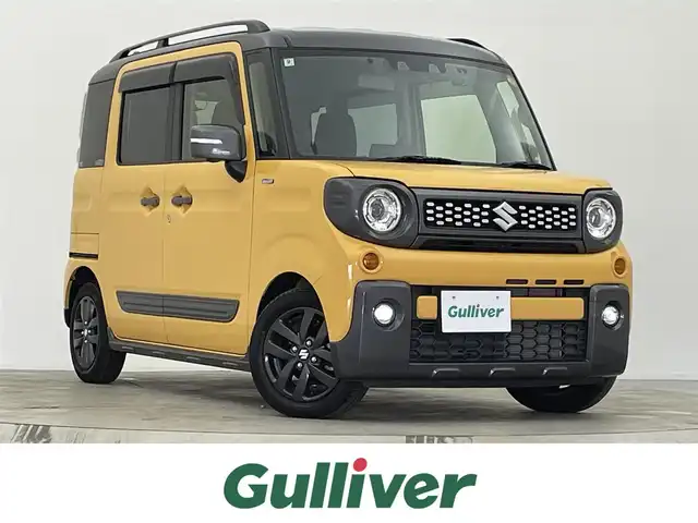 スズキ スペーシア ギア HYBRID XZターボ 宮城県 2022(令4)年 0.9万km アクティブイエロー/ガンメタリック2トーン 純正９型ナビ　/全周囲カメラ　/両側電動スライドドア　/ヘッドアップディスプレイ/スマートフォン連携　/シートヒーター　/パーキングセンサー　/レーダークルーズコントロール　/衝突軽減ブレーキ　/レーンキープアシスト　/ＬＥＤヘッドライト　/オートハイビーム　/フルセグＴＶ/CD/DVDプレーヤー/前後ドライブレコーダー/ビルトインETC/充電用USBポート/TVキャンセラー/純正14インチAW/禁煙車