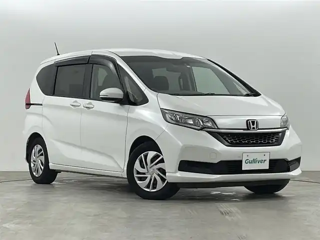 ホンダ フリード G ホンダセンシング 福島県 2020(令2)年 5.2万km プラチナホワイトパール ホンダセンシング　/・CMBS/・車線逸脱警報/・レーンアシスト/・レーダークルーズコントロール/バックカメラ　/純正ナビゲーション/【AM/FM/DVD/CD/Bluetooth/フルセグ】/型番:VXM-205CI/ドライブレコーダー　/両側パワースライドドア　/コーナーセンサー　/プッシュスタート　/・スマートキー　/・スペアキー　/ＬＥＤライト　/・オートライト　/寒冷地仕様　/ウィンカーミラー　/純正フロアマット/