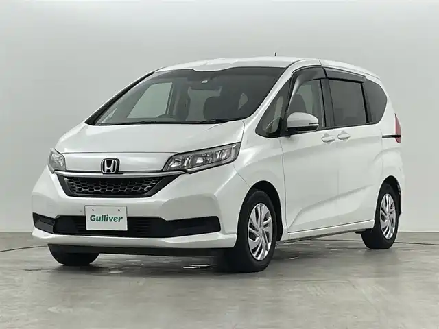 ホンダ フリード G ホンダセンシング 福島県 2020(令2)年 5.2万km プラチナホワイトパール ホンダセンシング　/・CMBS/・車線逸脱警報/・レーンアシスト/・レーダークルーズコントロール/バックカメラ　/純正ナビゲーション/【AM/FM/DVD/CD/Bluetooth/フルセグ】/型番:VXM-205CI/ドライブレコーダー　/両側パワースライドドア　/コーナーセンサー　/プッシュスタート　/・スマートキー　/・スペアキー　/ＬＥＤライト　/・オートライト　/寒冷地仕様　/ウィンカーミラー　/純正フロアマット/