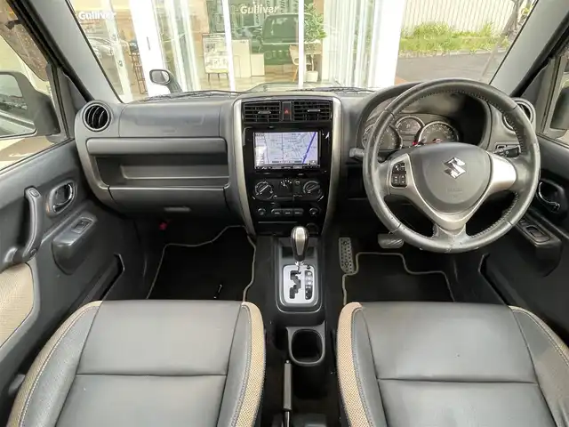 スズキ ジムニー ランドベンチャー 道央・札幌 2016(平28)年 4.6万km クールカーキPM ・４WD/・純正ナビ/　CD＆DVD＆BT＆TV/・シートヒーター/・ミラーヒーター/・社外マフラー/・ETC/・電動格納ミラー/・ステアリングスイッチ/・純正フロアマット/・ウィンカーミラー/・リモコンキー/・フォグライト/・スペアキー