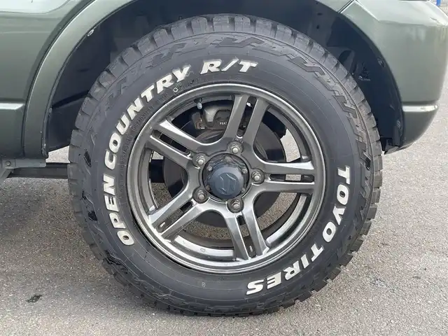 スズキ ジムニー ランドベンチャー 道央・札幌 2016(平28)年 4.6万km クールカーキPM ・４WD/・純正ナビ/　CD＆DVD＆BT＆TV/・シートヒーター/・ミラーヒーター/・社外マフラー/・ETC/・電動格納ミラー/・ステアリングスイッチ/・純正フロアマット/・ウィンカーミラー/・リモコンキー/・フォグライト/・スペアキー