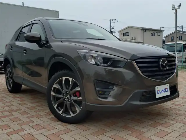 マツダ ＣＸ－５ XD Lパッケージ 新潟県 2016(平28)年 10.9万km チタニウムフラッシュマイカ (株)IDOMが運営する【じしゃロン新潟店】の自社ローン専用車両になります。/こちらは現金またはオートローンご利用時の価格です。自社ローンご希望の方は別途その旨お申付け下さい/ワンオーナー/4WD/純正SDナビ/FM/AM/CD/DVD視聴可能/フルセグTV視聴可能(走行中視聴不可)/Bluetooth/USB/AUX接続可能/バックカメラ/ETC/クルーズコントロール/プッシュスタート/電動パーキングブレーキ/シートメモリー機能/パワーシート(D席+N席)/シートヒーター(D席+N席)/レーンキープアシスト機能/電動格納ウィンカーミラー/コーナーセンサー(後方のみ)/スマートキー/取扱説明書