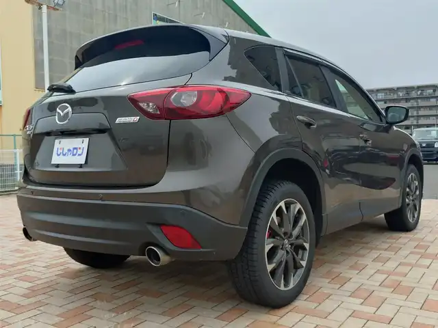 マツダ ＣＸ－５ XD Lパッケージ 新潟県 2016(平28)年 10.9万km チタニウムフラッシュマイカ (株)IDOMが運営する【じしゃロン新潟店】の自社ローン専用車両になります。/こちらは現金またはオートローンご利用時の価格です。自社ローンご希望の方は別途その旨お申付け下さい/ワンオーナー/4WD/純正SDナビ/FM/AM/CD/DVD視聴可能/フルセグTV視聴可能(走行中視聴不可)/Bluetooth/USB/AUX接続可能/バックカメラ/ETC/クルーズコントロール/プッシュスタート/電動パーキングブレーキ/シートメモリー機能/パワーシート(D席+N席)/シートヒーター(D席+N席)/レーンキープアシスト機能/電動格納ウィンカーミラー/コーナーセンサー(後方のみ)/スマートキー/取扱説明書
