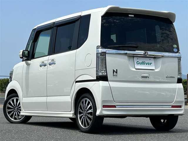 ホンダ Ｎ ＢＯＸ カスタム G ターボ Lパッケージ 島根県 2015(平27)年 6.9万km プレミアムホワイトパールⅡ CTBA/純正ナビ/CD/DVD/DTV/Bluetooth/バックカメラ/両側パワースライドドア/クルーズコントロール/ETC/ステアリングスイッチ/パドルシフト/HIDオートライト/純正フロアマット/ドアバイザー/純正アルミホイール/スマートキー/プッシュスタート