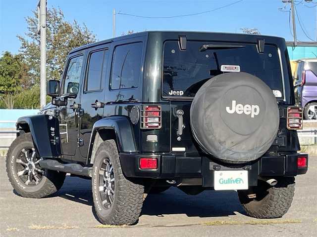 クライスラー・ジープ ジープ ラングラー アンリミテッド サハラ 道央・札幌 2012(平24)年 7.3万km ブラックフォレストグリーン ４WD/社外メモリーナビ/CD/DVD/BT/フルセグ/横滑り防止装置/クルーズコントロール/バックカメラ/サイドカメラ/ETC/トランスファレバー/ドライブレコーダー/革巻きステアリング/ステアリングリモコン/MTモード付AT/リモコンキー/ハロゲンヘッドライト/オートライト/フォグランプ/ヘッドライトレベライザー/ヒーテッドドアミラー/スペアキー/純正AW付冬タイヤ積込/265/65/R17/2019年/山8mm