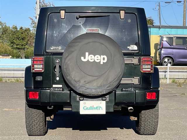 クライスラー・ジープ ジープ ラングラー アンリミテッド サハラ 道央・札幌 2012(平24)年 7.3万km ブラックフォレストグリーン ４WD/社外メモリーナビ/CD/DVD/BT/フルセグ/横滑り防止装置/クルーズコントロール/バックカメラ/サイドカメラ/ETC/トランスファレバー/ドライブレコーダー/革巻きステアリング/ステアリングリモコン/MTモード付AT/リモコンキー/ハロゲンヘッドライト/オートライト/フォグランプ/ヘッドライトレベライザー/ヒーテッドドアミラー/スペアキー/純正AW付冬タイヤ積込/265/65/R17/2019年/山8mm