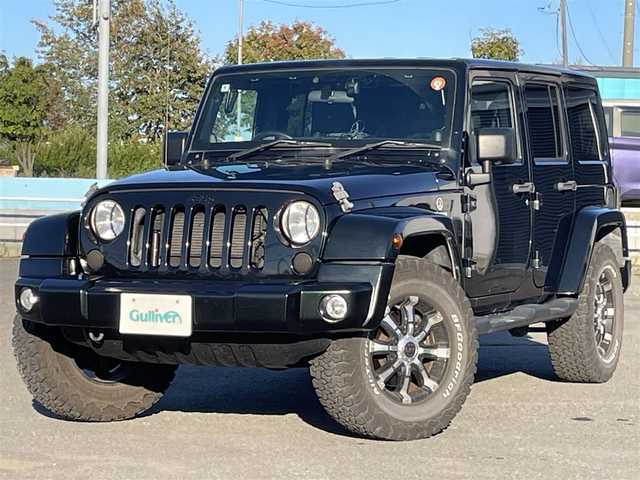 クライスラー・ジープ ジープ ラングラー アンリミテッド サハラ 道央・札幌 2012(平24)年 7.3万km ブラックフォレストグリーン ４WD/社外メモリーナビ/CD/DVD/BT/フルセグ/横滑り防止装置/クルーズコントロール/バックカメラ/サイドカメラ/ETC/トランスファレバー/ドライブレコーダー/革巻きステアリング/ステアリングリモコン/MTモード付AT/リモコンキー/ハロゲンヘッドライト/オートライト/フォグランプ/ヘッドライトレベライザー/ヒーテッドドアミラー/スペアキー/純正AW付冬タイヤ積込/265/65/R17/2019年/山8mm