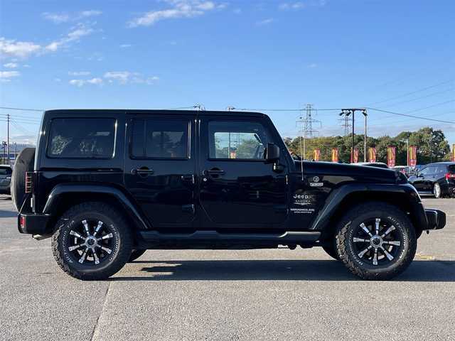 クライスラー・ジープ ジープ ラングラー アンリミテッド サハラ 道央・札幌 2012(平24)年 7.3万km ブラックフォレストグリーン ４WD/社外メモリーナビ/CD/DVD/BT/フルセグ/横滑り防止装置/クルーズコントロール/バックカメラ/サイドカメラ/ETC/トランスファレバー/ドライブレコーダー/革巻きステアリング/ステアリングリモコン/MTモード付AT/リモコンキー/ハロゲンヘッドライト/オートライト/フォグランプ/ヘッドライトレベライザー/ヒーテッドドアミラー/スペアキー/純正AW付冬タイヤ積込/265/65/R17/2019年/山8mm