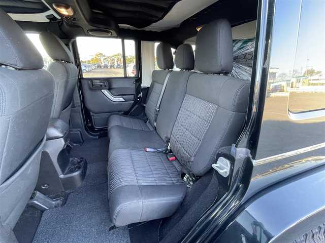 クライスラー・ジープ ジープ ラングラー アンリミテッド サハラ 道央・札幌 2012(平24)年 7.3万km ブラックフォレストグリーン ４WD/社外メモリーナビ/CD/DVD/BT/フルセグ/横滑り防止装置/クルーズコントロール/バックカメラ/サイドカメラ/ETC/トランスファレバー/ドライブレコーダー/革巻きステアリング/ステアリングリモコン/MTモード付AT/リモコンキー/ハロゲンヘッドライト/オートライト/フォグランプ/ヘッドライトレベライザー/ヒーテッドドアミラー/スペアキー/純正AW付冬タイヤ積込/265/65/R17/2019年/山8mm