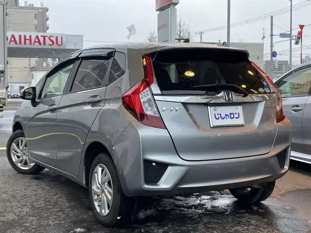 ホンダ フィット ハイブリット Lパッケージ 道央・札幌 2016(平28)年 8.4万km ティンテッドシルバーM (株)IDOMが運営する【じしゃロン札幌店】の自社ローン専用車両になりますこちらは現金またはオートローンご利用価格です。自社ローンご希望の方は別途その旨お申し付けください。・/４WD/純正8インチプレミアムインターナビ(VXM-165VFEi)/(AM/FM/ワンセグ/CD/DVD/Bluetooth/USB)/クルーズコントロール/ビルトインETC/純正フロアマット/プッシュスタート/保証書/取説