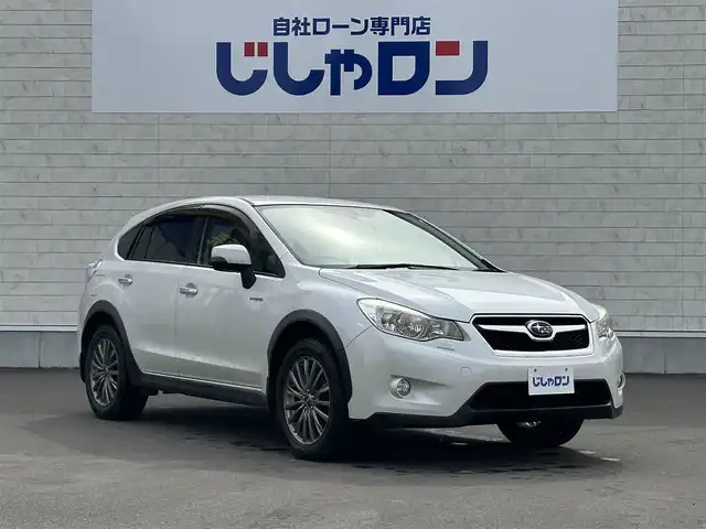 スバル インプレッサ ＸＶ ハイブリッド 2．0i－L 道北・旭川 2013(平25)年 8.2万km サテンホワイトパール (株)IDOMが運営する【じしゃロン旭川店】の自社ローン専用車両になります。こちらは現金またはオートローンご利用時の価格です。自社ローンご希望の方は別途その旨お申付け下さい/　/・純正ナビ（CD/DVD/HDD/SD/BT/フルセグ）/・ETC/・クルーズコントロール/・パドルシフト/・両席パワーシート/・フォグランプ/・スマートキー２個/・取扱説明書