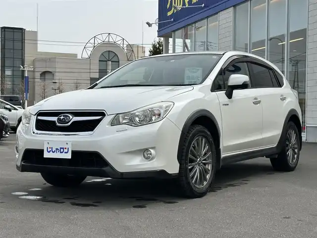 スバル インプレッサ ＸＶ ハイブリッド 2．0i－L 道北・旭川 2013(平25)年 8.2万km サテンホワイトパール (株)IDOMが運営する【じしゃロン旭川店】の自社ローン専用車両になります。こちらは現金またはオートローンご利用時の価格です。自社ローンご希望の方は別途その旨お申付け下さい/　/・純正ナビ（CD/DVD/HDD/SD/BT/フルセグ）/・ETC/・クルーズコントロール/・パドルシフト/・両席パワーシート/・フォグランプ/・スマートキー２個/・取扱説明書