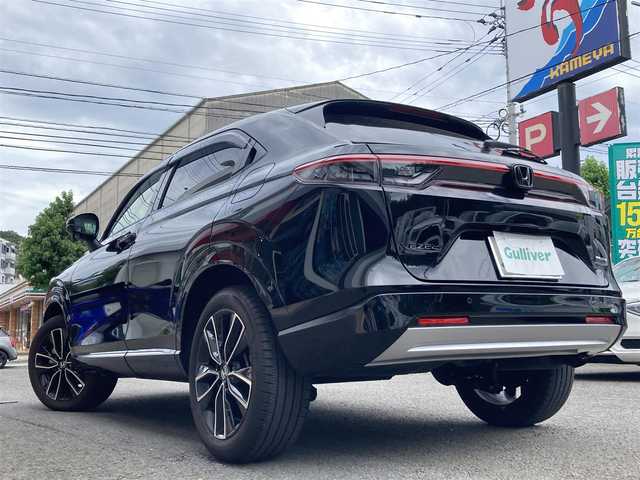 ホンダ ヴェゼル ハイブリッド e:HEV Z 長崎県 2024(令6)年 0.8万km クリスタルブラックパール ホンダセンシング/メーカーOPナビ/・Bluetooth/・フルセグTV/バックカメラ/ビルトインETC2.0/コーナーセンサー/パワーバックドア/ブラインドスポットインフォメーション/ワイヤレス充電器/ハンズフリーアクセスパワーテールゲート/ハーフレザーシート/シートヒーター/LEDオートヘッドライト/ダウンヒルアシスト/電子パーキング/オートホールド機能/ステアリングヒーター/パドルシフト/前後ドライブレコーダー
