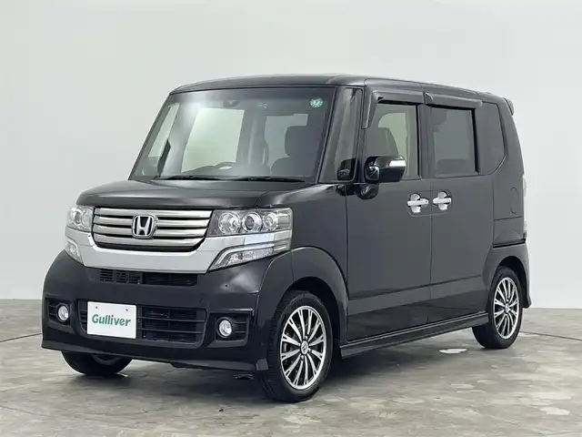 ホンダ Ｎ ＢＯＸ カスタム ターボ SSパッケージ 群馬県 2015(平27)年 2.7万km スマートブラック 衝突軽減　社外７型ナビ　両側パワースライドドア　　バックカメラ　ＨＩＤオートヘッドライト　前後ドライブレコーダー　純正１５インチアルミホイール　クルーズコントロール　ＥＴＣパドルシフト　ＡＢＳ　禁煙車