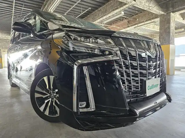 トヨタ アルファード S Cパッケージ 宮崎県 2020(令2)年 6.7万km ブラック 〇ツインムーンルーフ/〇9インチディスプレイオーディオ/〇フルセグTV/〇両側パワースライドドア/〇パワーバックドア/〇バックカメラ/〇ビルトインETC/〇ドライブレコーダー/〇リアシートエンターテインメントシステム/〇レーダークルーズコントロール/〇コーナーセンサー/〇セーフティセンス/〇インテリジェントクリアランスソナー/〇三眼LEDヘッドランプ/〇LEDフロントフォグランプ/〇革巻きコンビステアリングホイール/〇ステアリングヒーター/〇ブラック合皮シート/〇パワーシート/〇シートヒーター/エアシート/〇純正18インチアルミホイール/〇TRDエアロ(F)/〇モデリスタエアロ(S/R)/〇スマートエントリー/プッシュスタートシステム/〇禁煙車